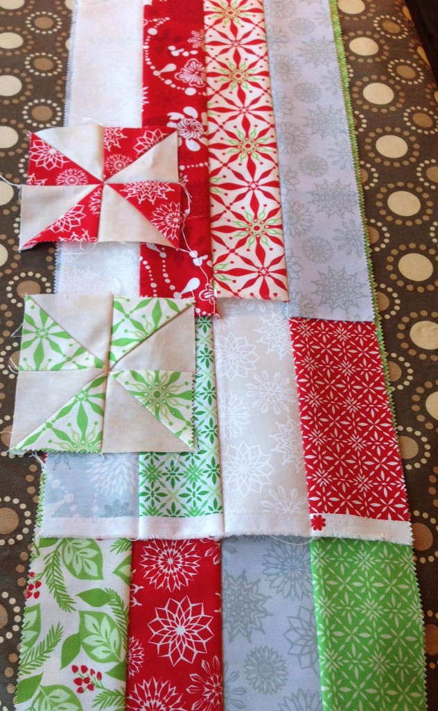 Christmas Blizzard in progress.  Fabric is Solstice by Kate Spain, except the pinwheel background which is Moda Marble